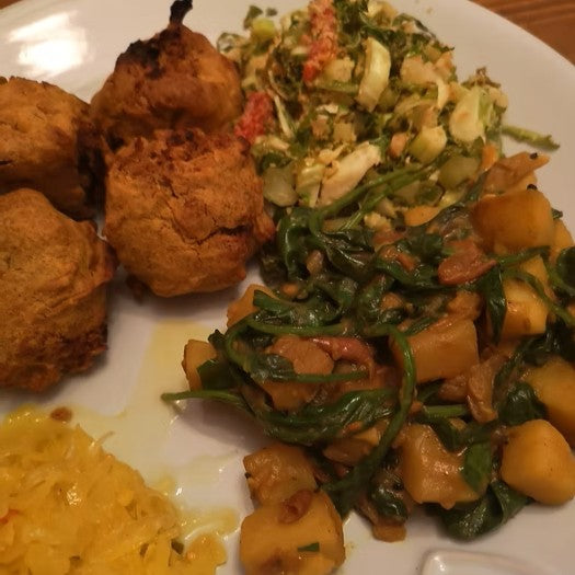 A plate of bhajis, saag aloo and not your nanas piccalilli