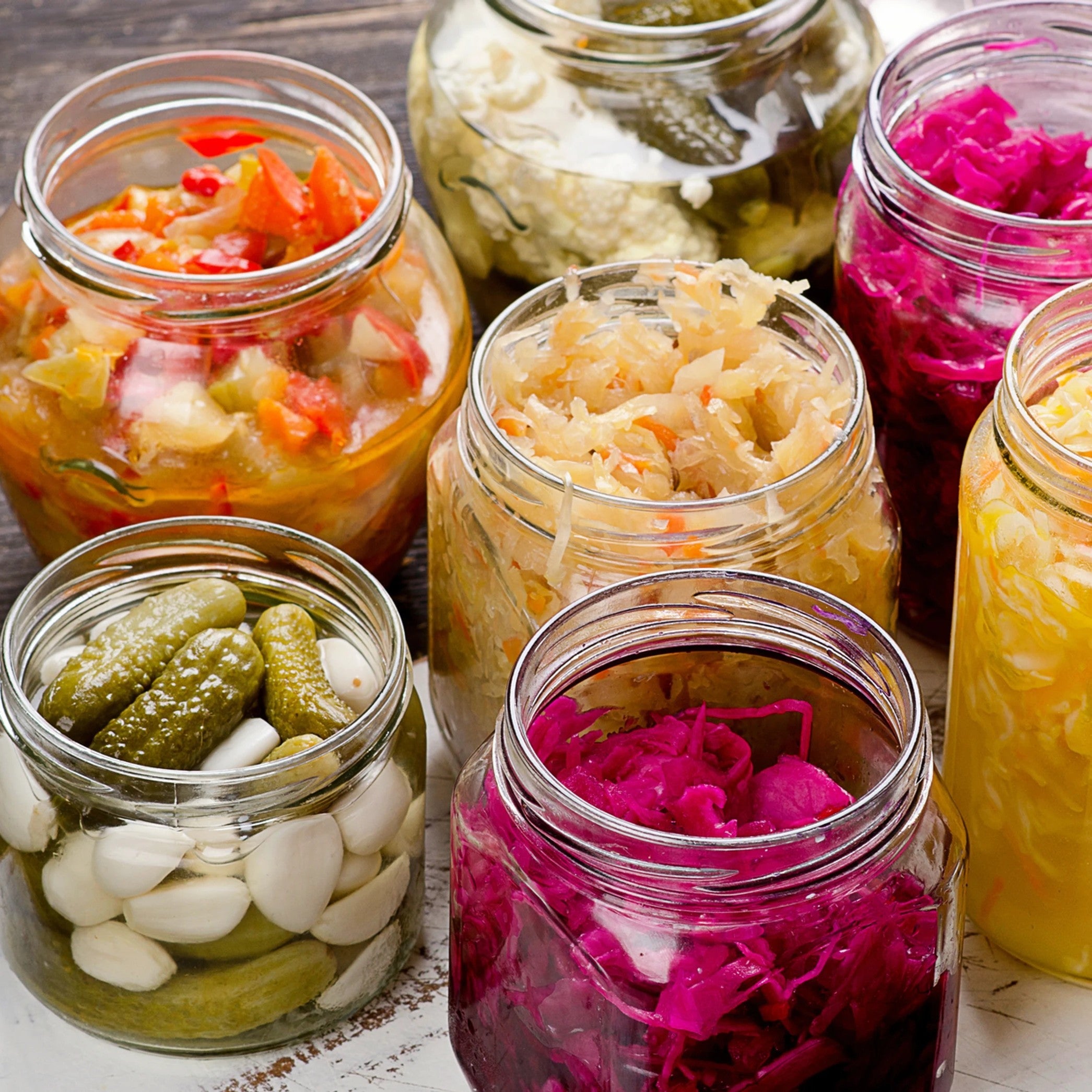 A bottle that reads probiotics and natural fruits ,veg and pulses placed infront