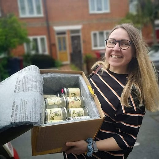A happy customer returning our jars to us