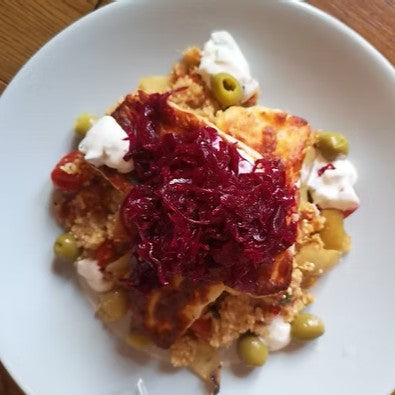 Roasted tomato quinoa with halloumi & Reclaimed Red Kraut