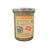 A glass jar of dill pickle kraut turned to the side so ingredients are visible against a white background