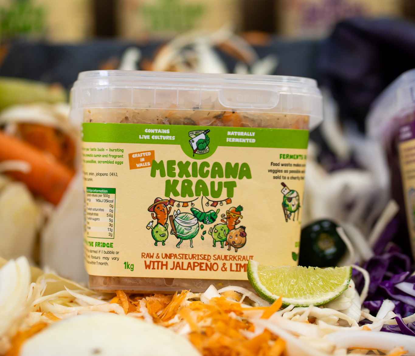 Container of Mexicana Kraut with vegetables in the background